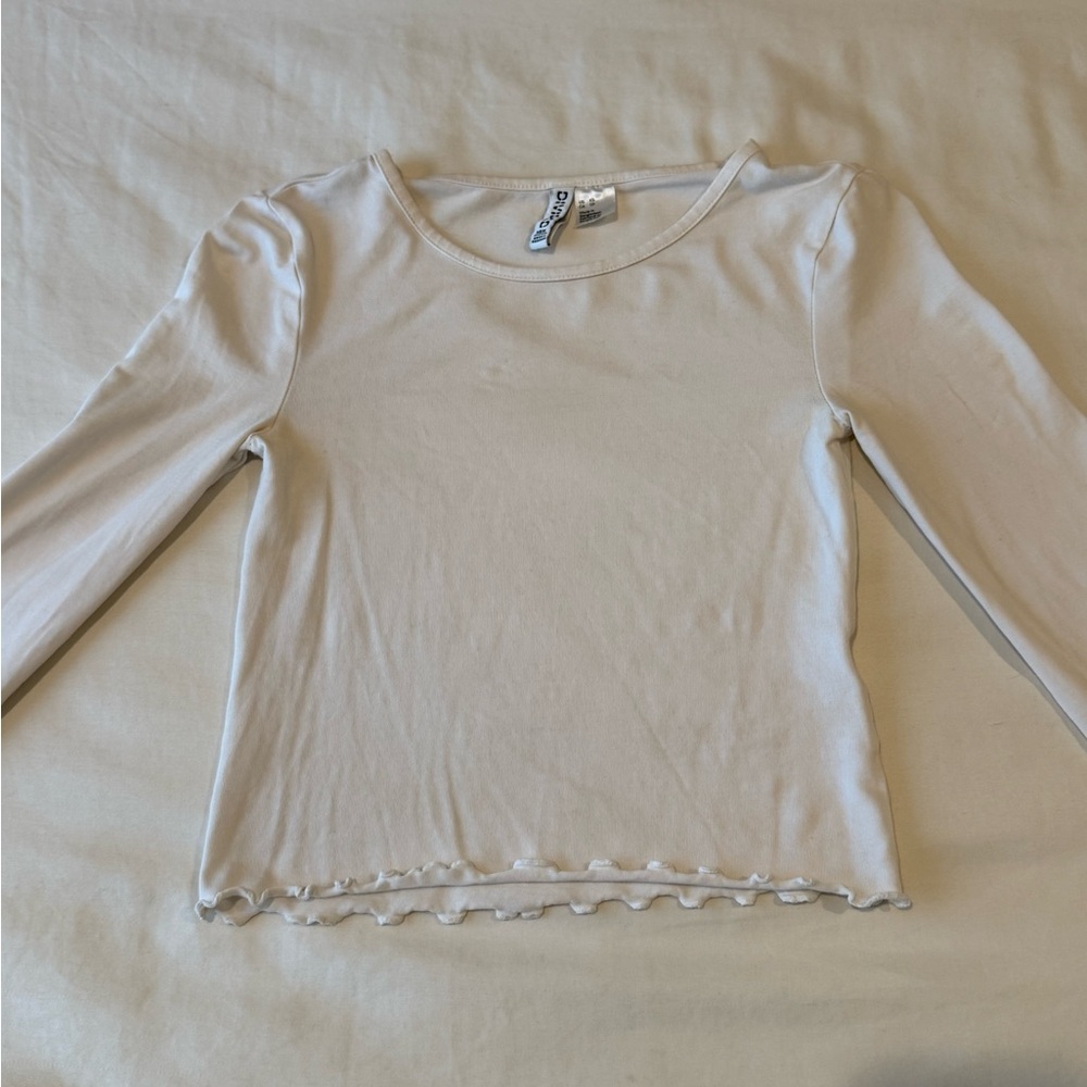 Cream Long Sleeve Top with Ruffled Hem